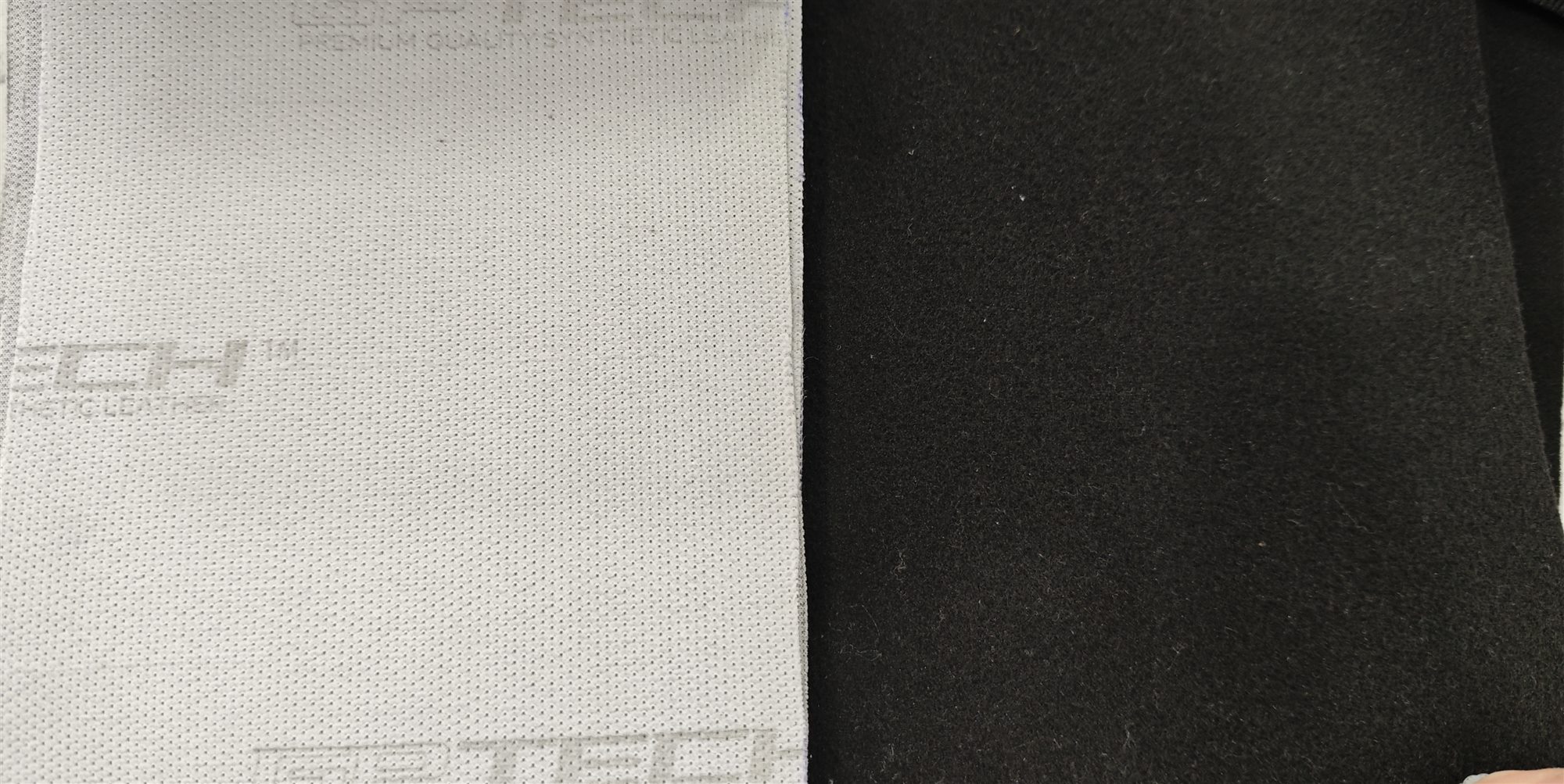 Comparison of white mesh backing and black brushed backing